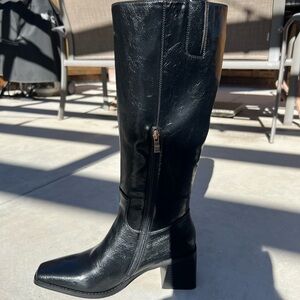Sleek Black Leather Heeled Boots